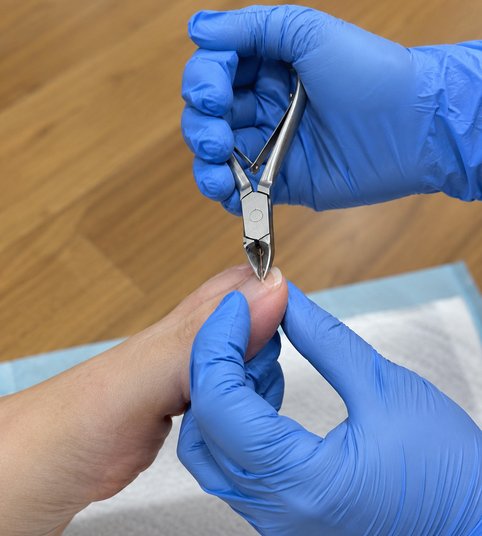 Professional nail care with podiatry clippers